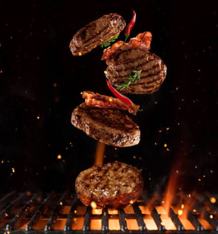 Carnes a la parrilla con bacon, chile y fuego